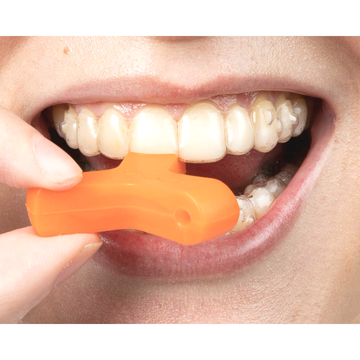 Orange Munchie engaged with top teeth